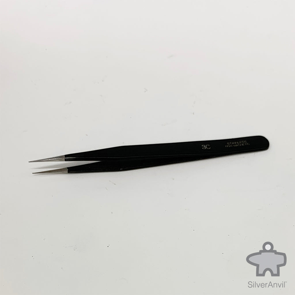 Coated Anti-Magetic Tweezers