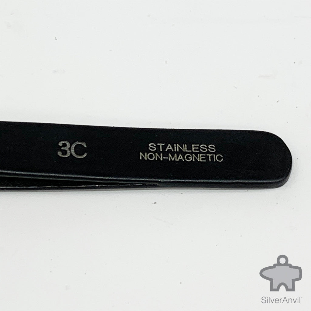 Coated Anti-Magetic Tweezers