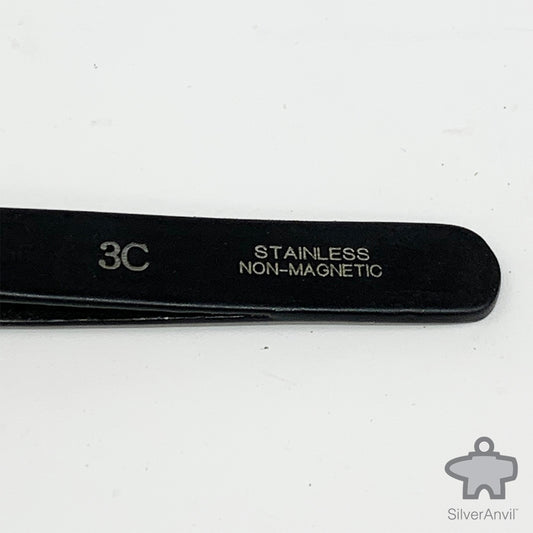 Coated Anti-Magetic Tweezers